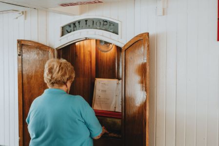 a boy standing in front of a door